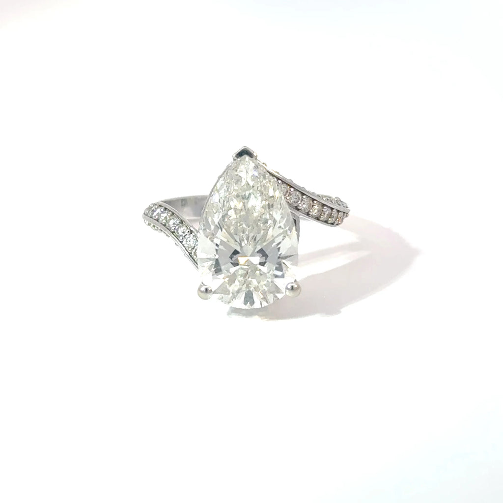 4 CARAT PEAR SHAPE DIAMOND RING