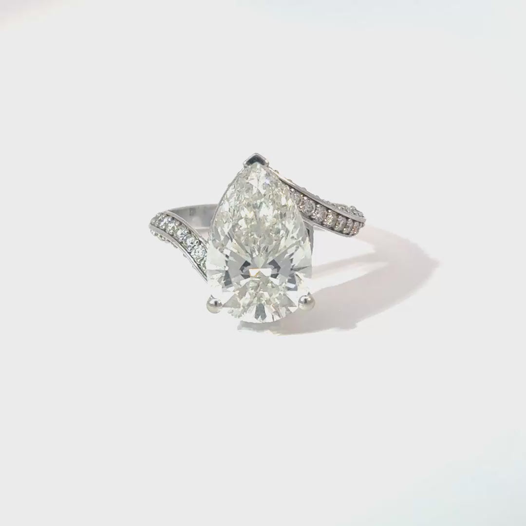 4 CARAT PEAR SHAPE DIAMOND RING